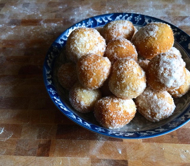 zeppoles with granulated white sugar and coconuts